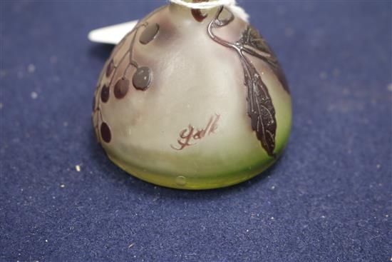 A Galle bottle-shaped cameo glass vase decorated with berries and leaves